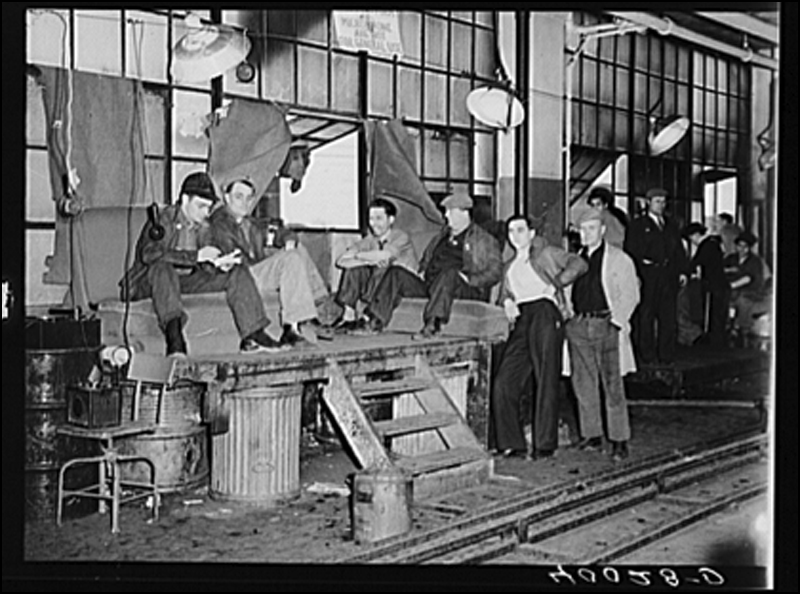 Sit-down strikers guarding window entrance to the Fisher body plant number three. Photo by Sheldon Dick, 1937